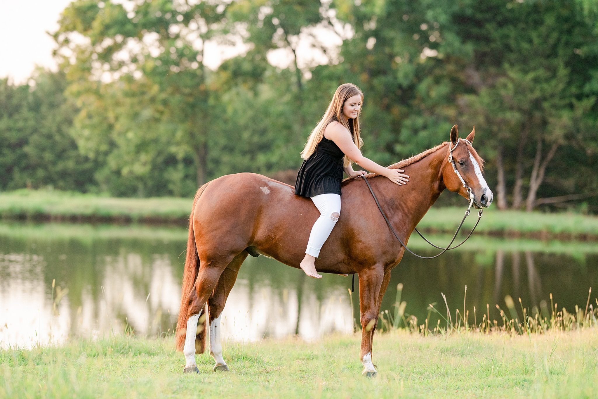 https://kirstiemarie.com/wp-content/uploads/2020/09/Sydnie-Ochs-and-No-Doubting-Me-AQHYA-World-Champion-Western-Pleasure-Senior-Pictures-Kirstie-Marie-Photography_0016-2048x1365.jpg